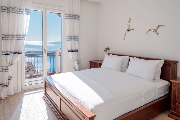 Imagen de la habitación del Hotel Lustica Bay. Foto 13