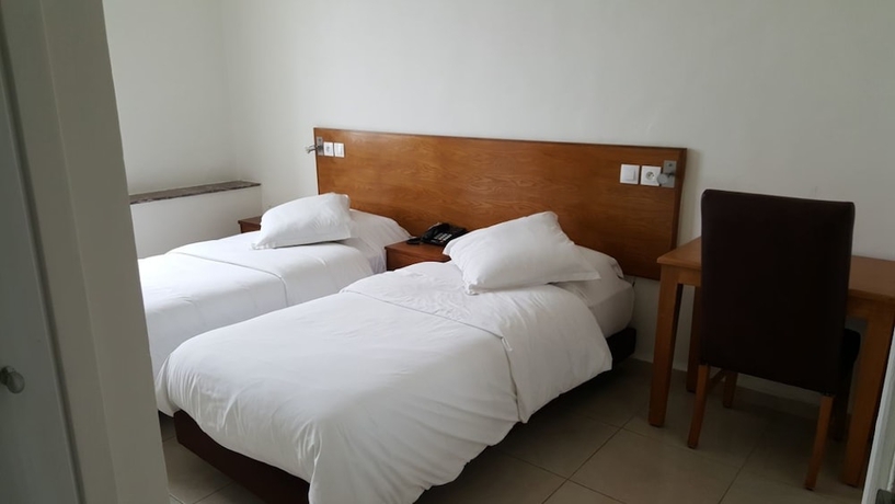 Imagen de la habitación del Hotel Lutece. Foto 9