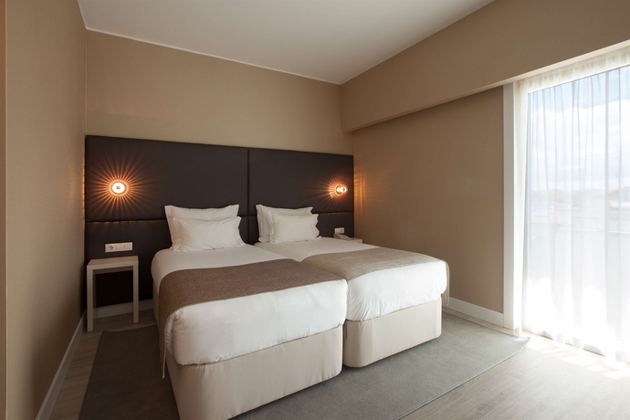 Imagen de la habitación del Hotel Lutecia Smart Design. Foto 11