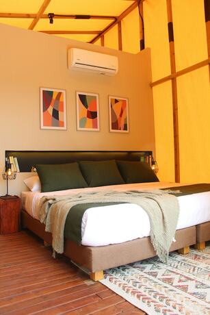 Imagen de la habitación del Hotel Luum Glamping. Foto 19
