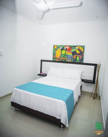Imagen de la habitación del Hotel Luvana Suite. Foto 5