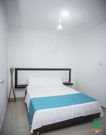 Imagen de la habitación del Hotel Luvana Suite. Foto 19