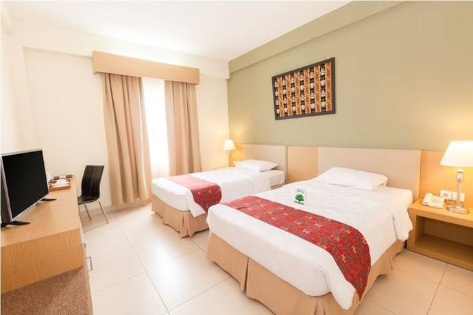 Imagen de la habitación del Hotel Luwansa Hotel. Foto 14