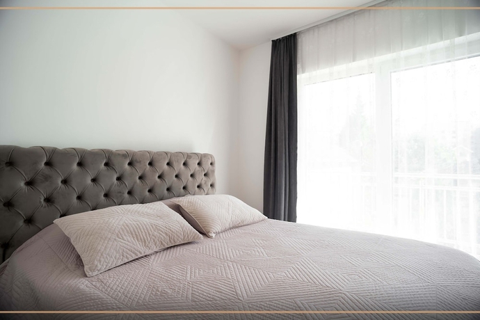 Imagen de la habitación del Hotel Lux Apartments. Foto 4