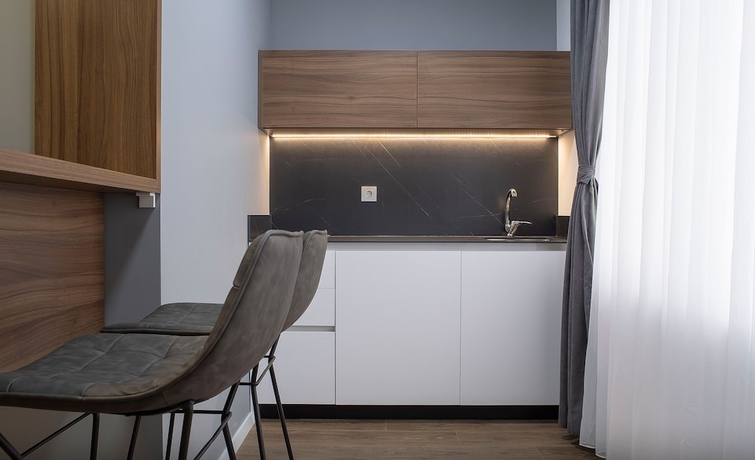 Imagen de la habitación del Hotel Lux Apartments. Foto 11