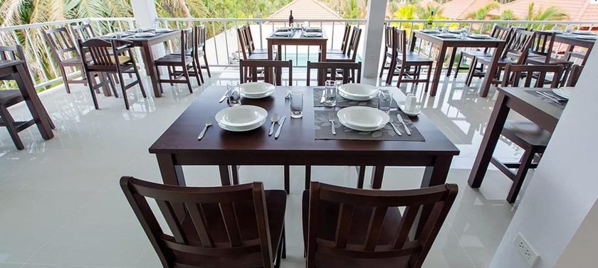 Imagen del bar/restaurante del Hotel Lux Family Villas. Foto 4