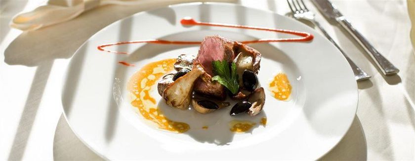 Imagen del bar/restaurante del Hotel Lux Garden. Foto 6