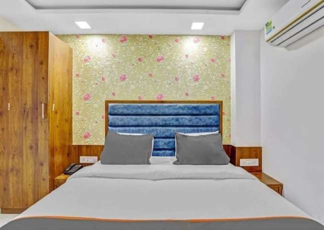Imagen de la habitación del Hotel Lux Inn, Ahmedabad. Foto 7