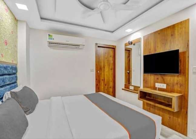 Imagen de la habitación del Hotel Lux Inn, Ahmedabad. Foto 8