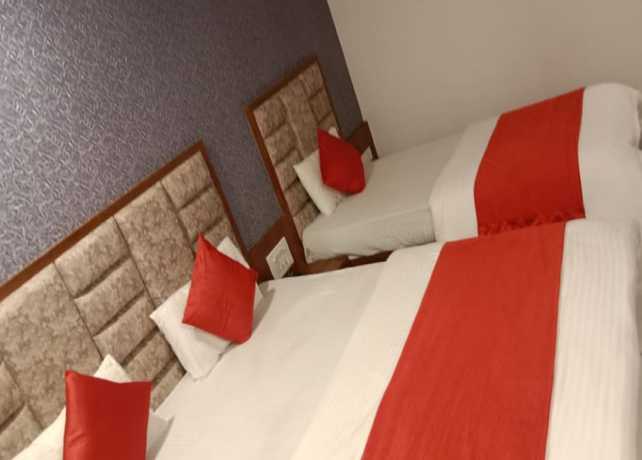 Imagen de la habitación del Hotel Lux Inn, Ahmedabad. Foto 11