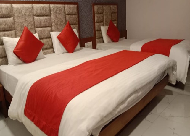 Imagen de la habitación del Hotel Lux Inn, Ahmedabad. Foto 13