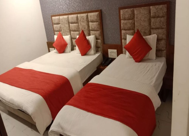 Imagen de la habitación del Hotel Lux Inn, Ahmedabad. Foto 14