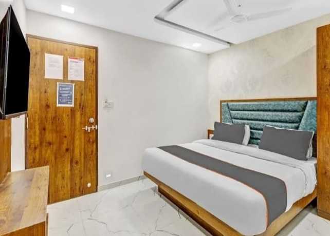 Imagen de la habitación del Hotel Lux Inn, Ahmedabad. Foto 16