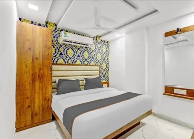Imagen de la habitación del Hotel Lux Inn, Ahmedabad. Foto 17