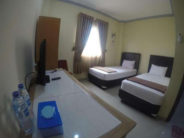 Imagen de la habitación del Hotel Lux Melati. Foto 5