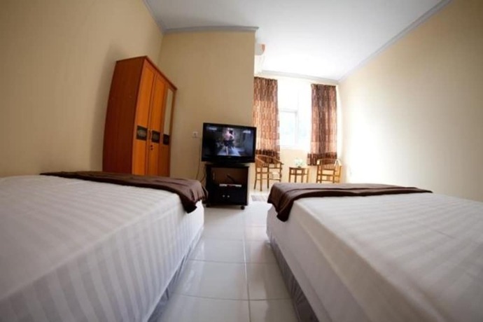 Imagen de la habitación del Hotel Lux Melati. Foto 8