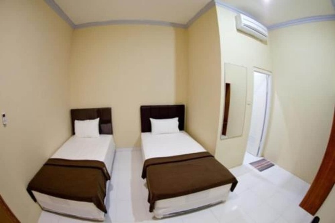 Imagen de la habitación del Hotel Lux Melati. Foto 9