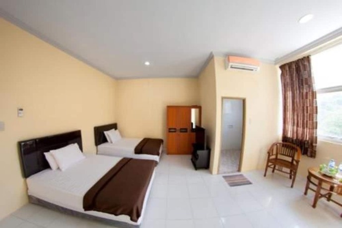 Imagen de la habitación del Hotel Lux Melati. Foto 11