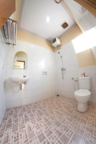 Imagen de la habitación del Hotel Lux Melati. Foto 12