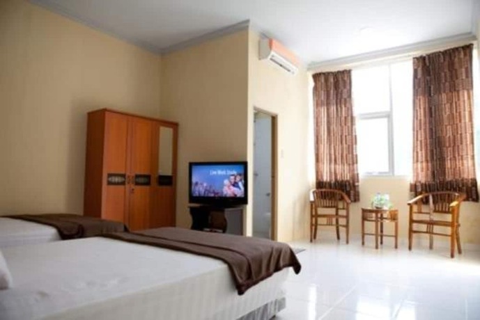 Imagen de la habitación del Hotel Lux Melati. Foto 13