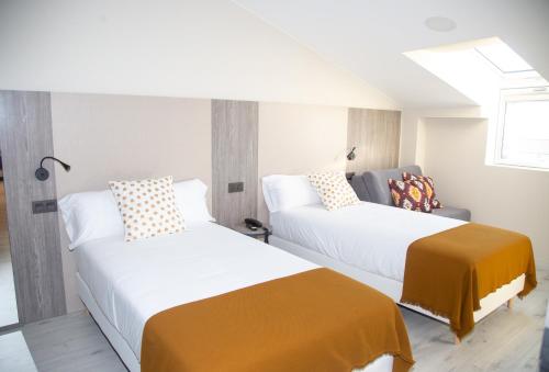 Imagen de la habitación del Hotel Lux Melide. Foto 2