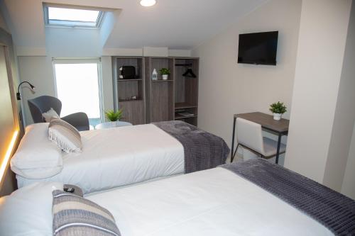 Imagen de la habitación del Hotel Lux Melide. Foto 5