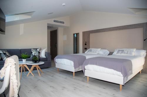 Imagen de la habitación del Hotel Lux Melide. Foto 6