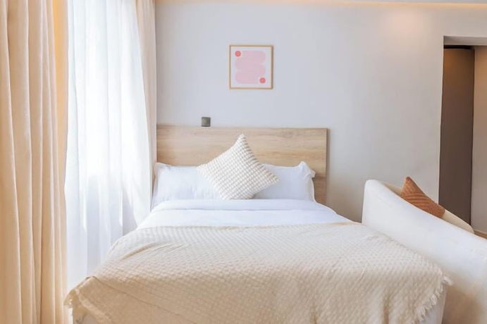 Imagen de la habitación del Hotel Lux Suites Studio City Apartments. Foto 5