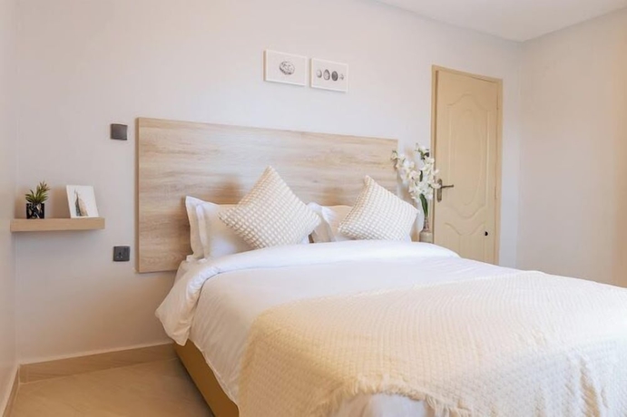 Imagen de la habitación del Hotel Lux Suites Studio City Apartments. Foto 6