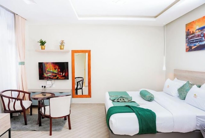 Imagen de la habitación del Hotel Lux Suites Studio City Apartments. Foto 9