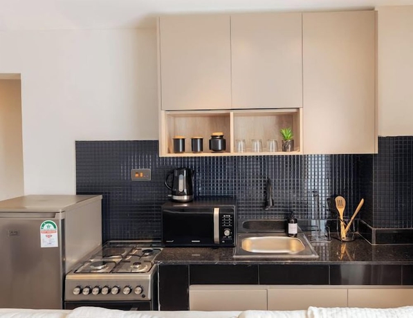 Imagen de la habitación del Hotel Lux Suites Studio City Apartments. Foto 14