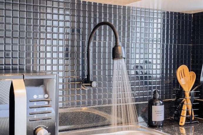 Imagen de la habitación del Hotel Lux Suites Studio City Apartments. Foto 15
