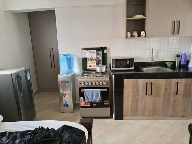 Imagen de la habitación del Hotel Lux Suites Studio City Apartments. Foto 16