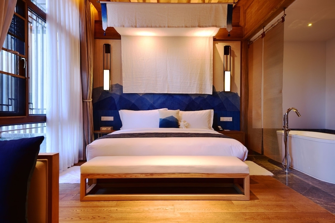 Imagen de la habitación del Hotel Lux Tea Horse Road Lijiang. Foto 9