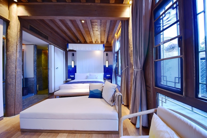 Imagen de la habitación del Hotel Lux Tea Horse Road Lijiang. Foto 11