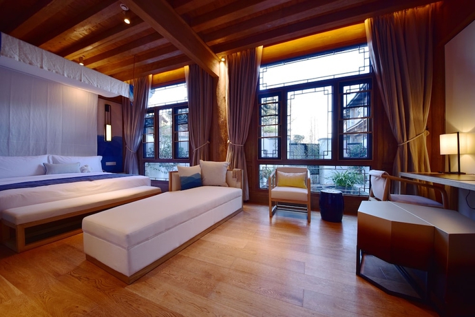 Imagen de la habitación del Hotel Lux Tea Horse Road Lijiang. Foto 14