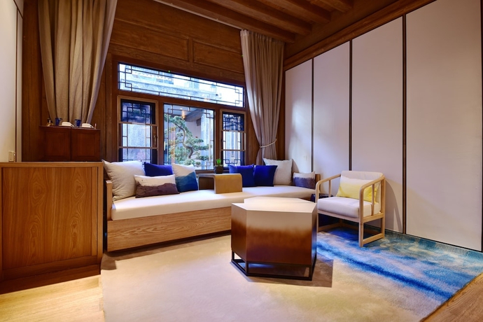 Imagen de la habitación del Hotel Lux Tea Horse Road Lijiang. Foto 15