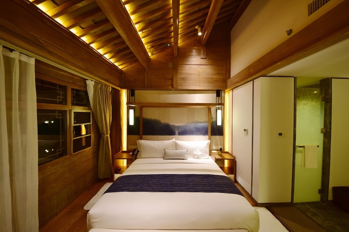 Imagen de la habitación del Hotel Lux Tea Horse Road Lijiang. Foto 16