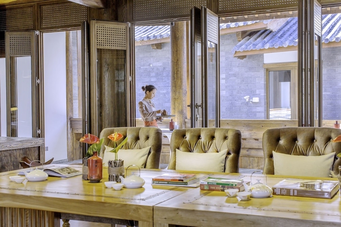 Imagen del bar/restaurante del Hotel Lux Tea Horse Road Lijiang. Foto 7