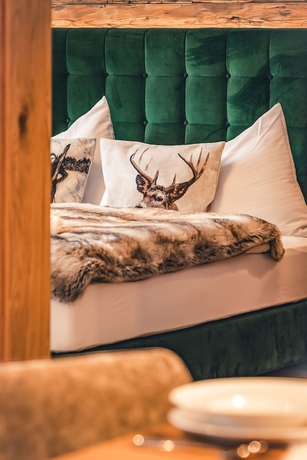 Imagen de la habitación del Hotel Lux-Alp Chalet. Foto 9