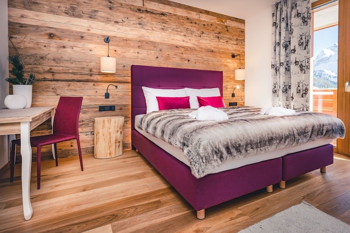 Imagen de la habitación del Hotel Lux-Alp Chalet. Foto 11