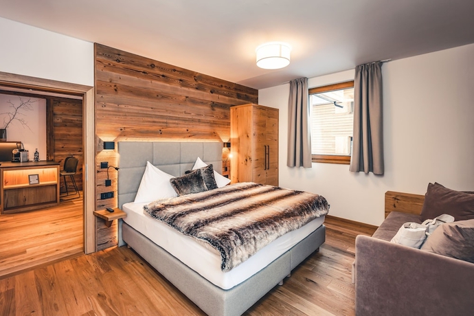 Imagen de la habitación del Hotel Lux-Alp Chalet. Foto 14