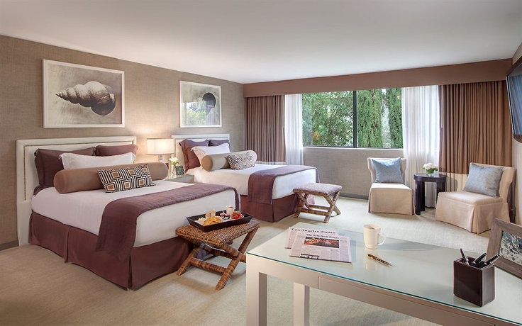 Imagen de la habitación del Hotel Luxe Sunset Boulevard. Foto 3