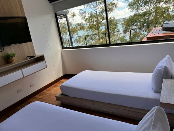 Imagen de la habitación del Hotel Luxé Cabañas. Foto 15