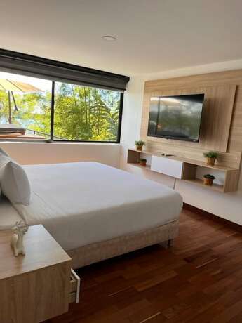 Imagen de la habitación del Hotel Luxé Cabañas. Foto 18