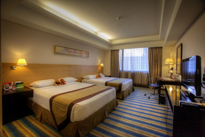 Imagen de la habitación del Hotel Luxent. Foto 12