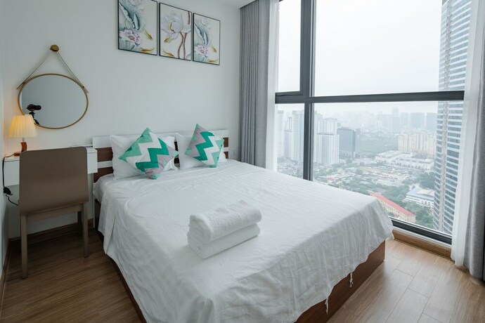 Imagen de la habitación del Hotel Luxhome Vinhomes Skylake. Foto 33