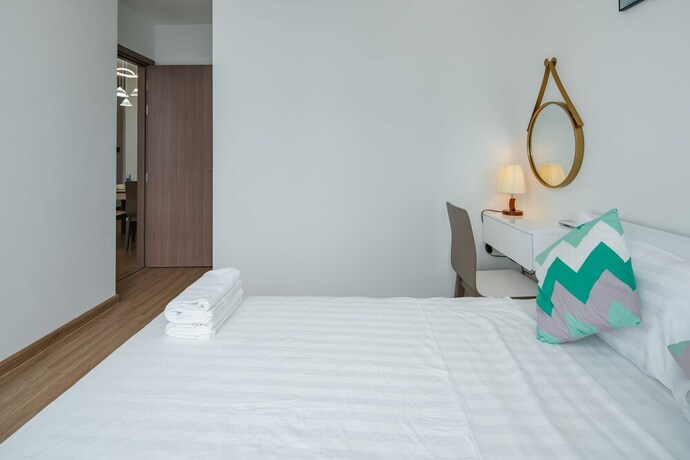 Imagen de la habitación del Hotel Luxhome Vinhomes Skylake. Foto 35