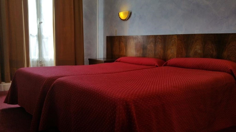 Imagen de la habitación del Hotel Luxia. Foto 14