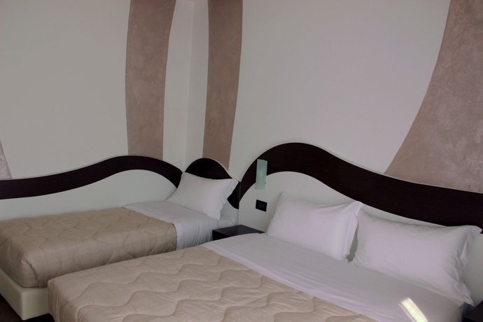 Imagen de la habitación del Hotel Luxor Florence. Foto 7